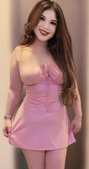 Attractive Russian escort in pink outfit for premium Gurgaon service